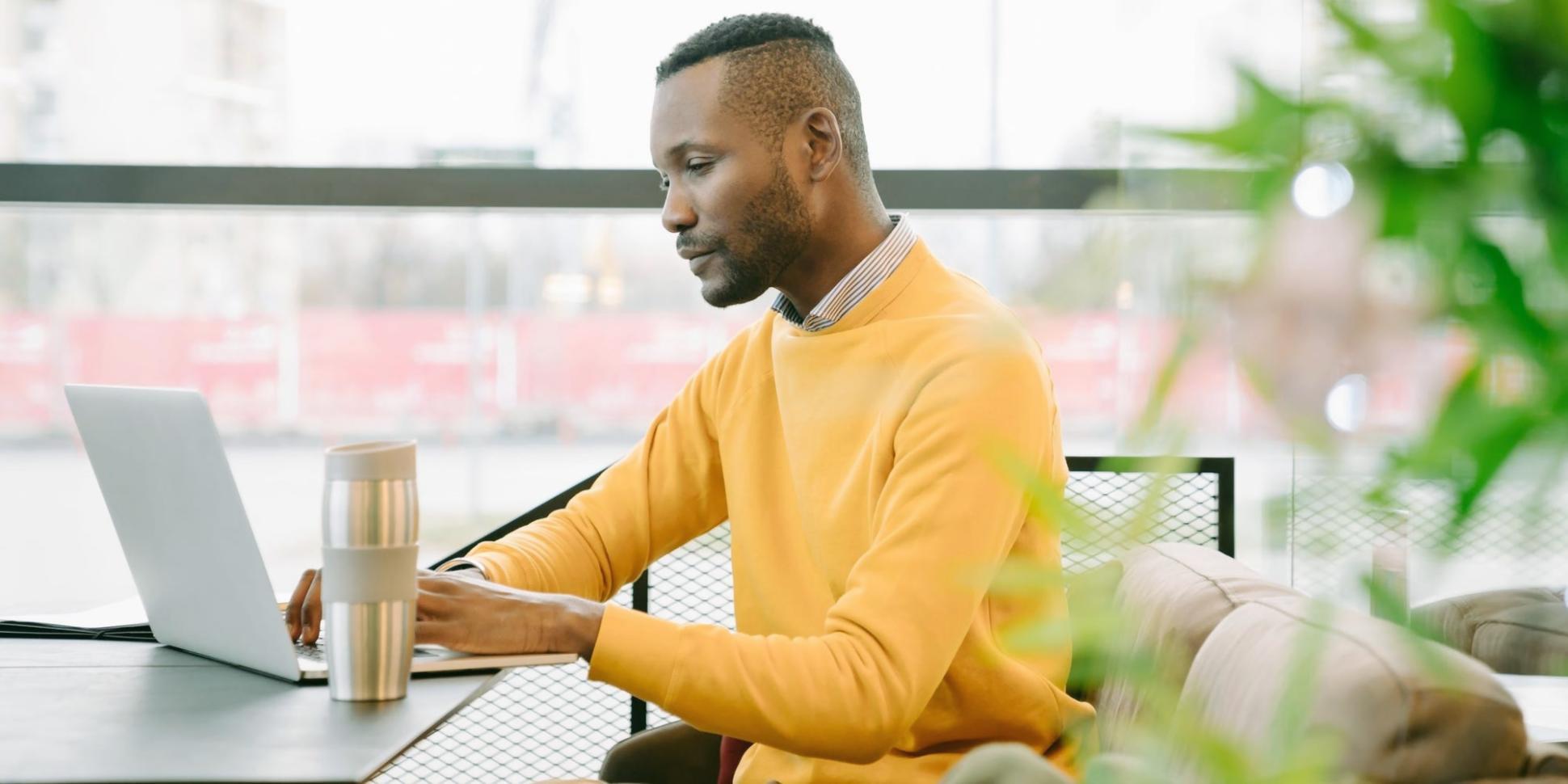 Person reviewing investment documents with confidence