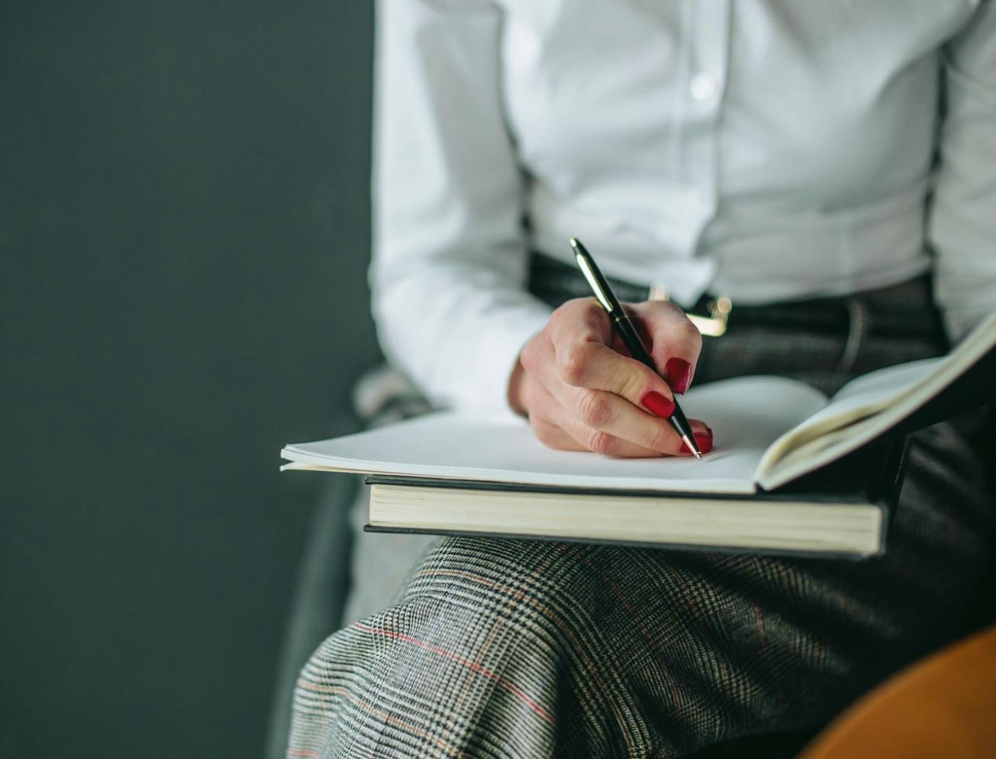 Individual contemplating financial decisions with thoughtful expression
